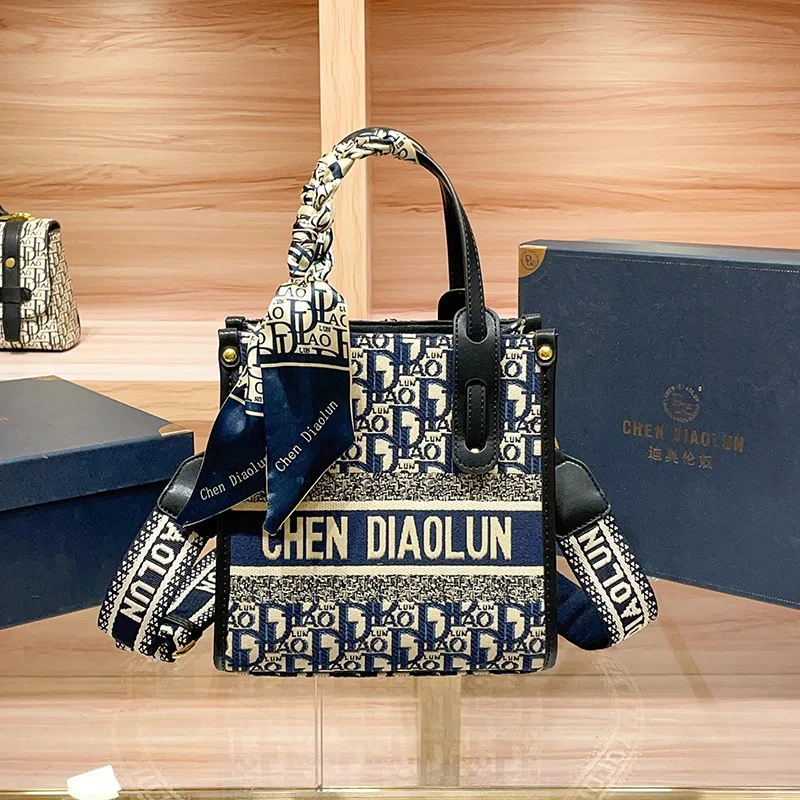 

2023 new canvas embroidery Tote small handbag vertical version single shoulder crossbody mobile phone bag silk scarf A941