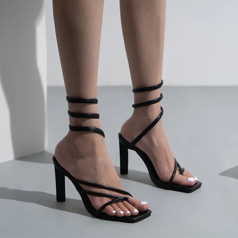 

Casual 10cm high-heeled Roman sandals with a word snake body around the belt outside wearing herringbone clip stiletto women