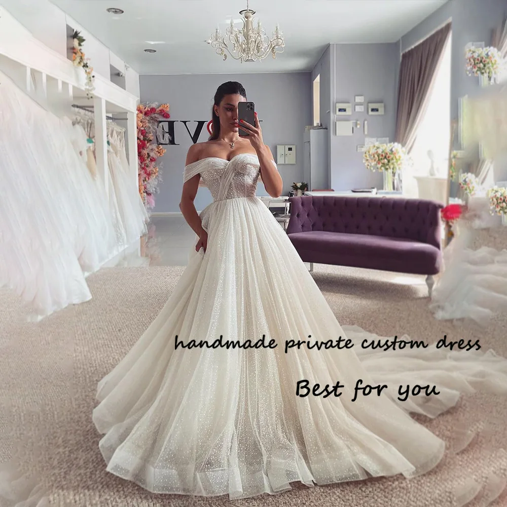 

Luxury Princess Wedding Dresses for Bridal Off Shoulder Sparkly Tulle Long A Line Bridal Gown with Train