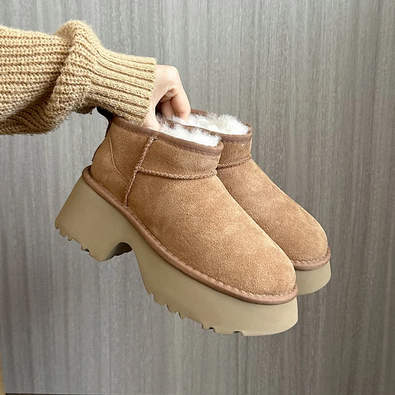 Зимние женские ботинки на толстом каблуке