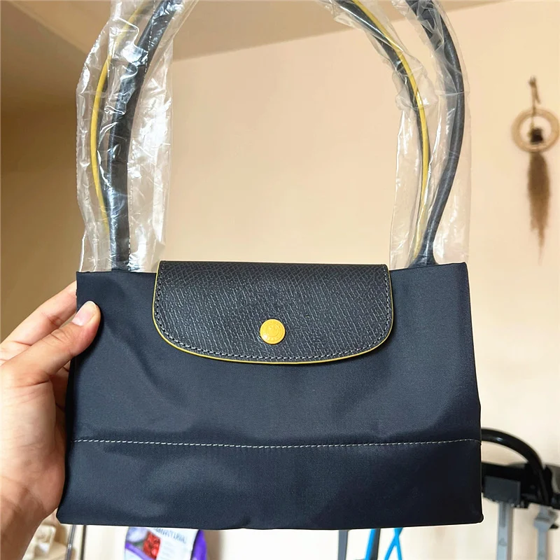 

Classic French Handheld Dumpling Bun Bag Cross-body Female Carrying Makeup Bag Foldable Waterproof Tote Bags Ladies Handbags