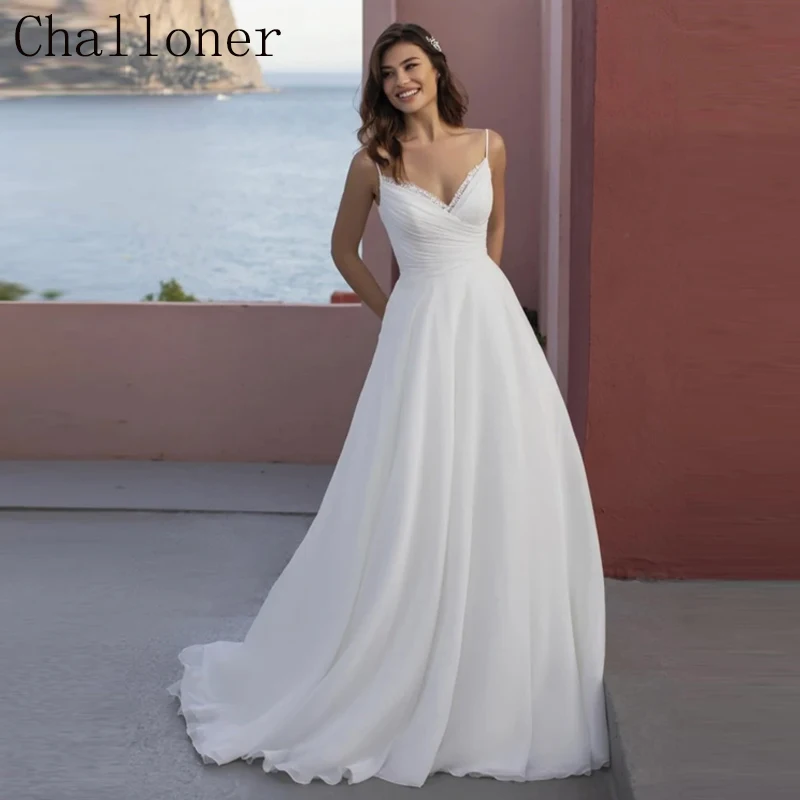 

Challoner Flowy Chiffon Wedding Dress Thin Spaghetti Strap Bridal Gown Minimalist V Neck Pleated Tulle Button Up Beach Custom