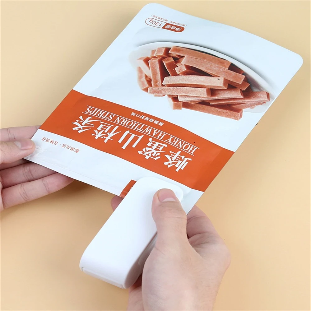 

Portable Mini Sealing Machine Food Plastic-Envelop Machine Snack Plastic Bag Sealer Household Manual Heat Sealer
