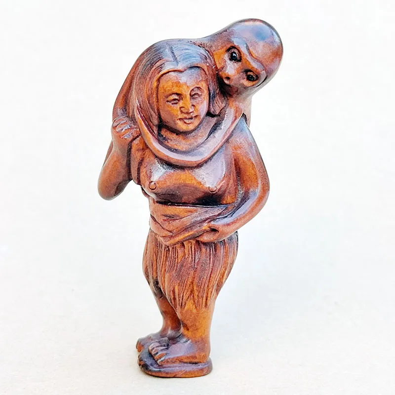 

Японская статуэтка из самшита "Девушка и осьминог"