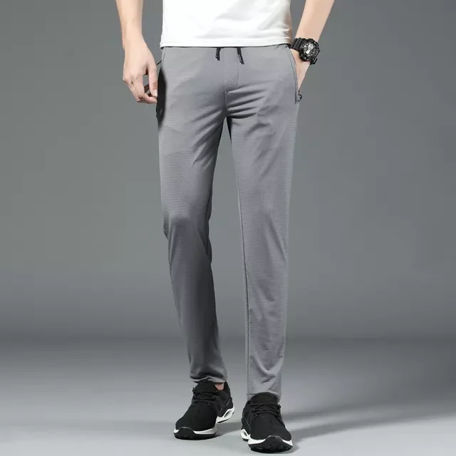 

NEW IN 2022 summer New Thin Mesh Breathable Casual Pants Men Slim Fit Fashion Trousers Male Brand Clothing Plus Size 28 33 36 38