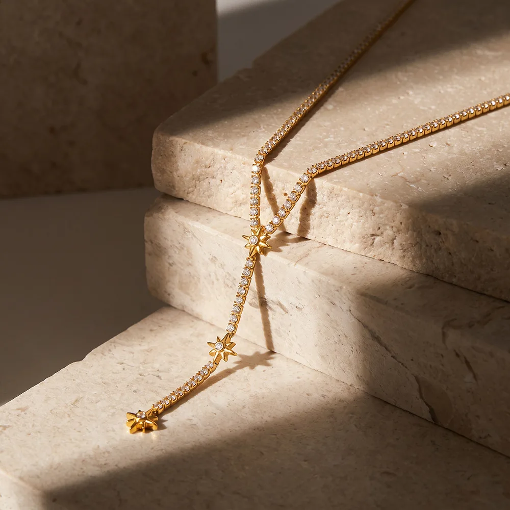 Фото Модное ожерелье-лариат из нержавеющей стали с позолотой 18K и 3 подвесками в виде звезд, водонепроницаемое, гипоаллергенное украшение. №3