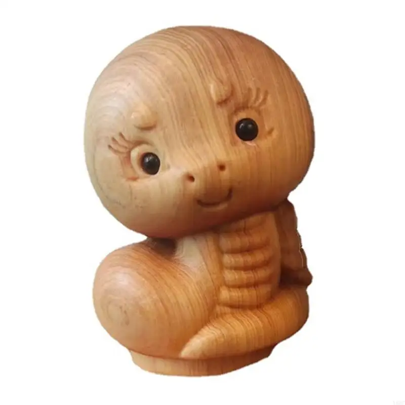 

Деревянная статуэтка змея