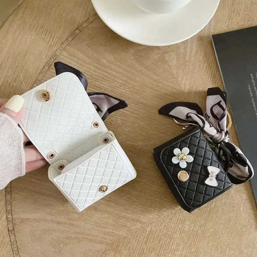 Фото 1 шт. Миниатюрный креативный кожаный чехол для Bluetooth-наушников, однотонный, с брелоком-подвеской, портативный чехол для хранения наушников, модный аксессуар для сумки №1
