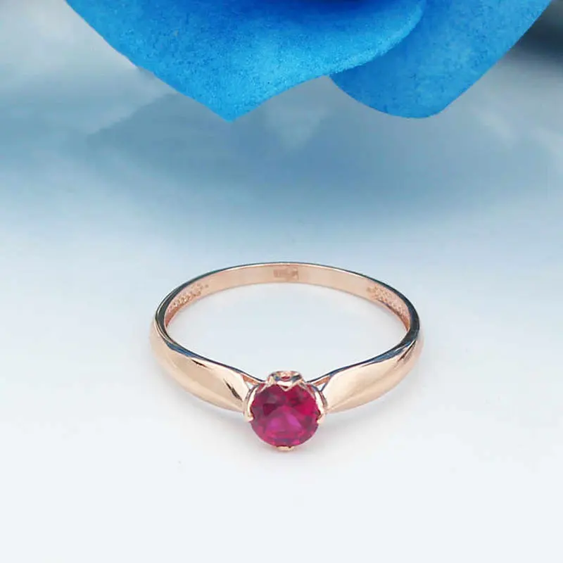 

Женское кольцо с красным камнем, розовое золото 585 пробы, 14 к