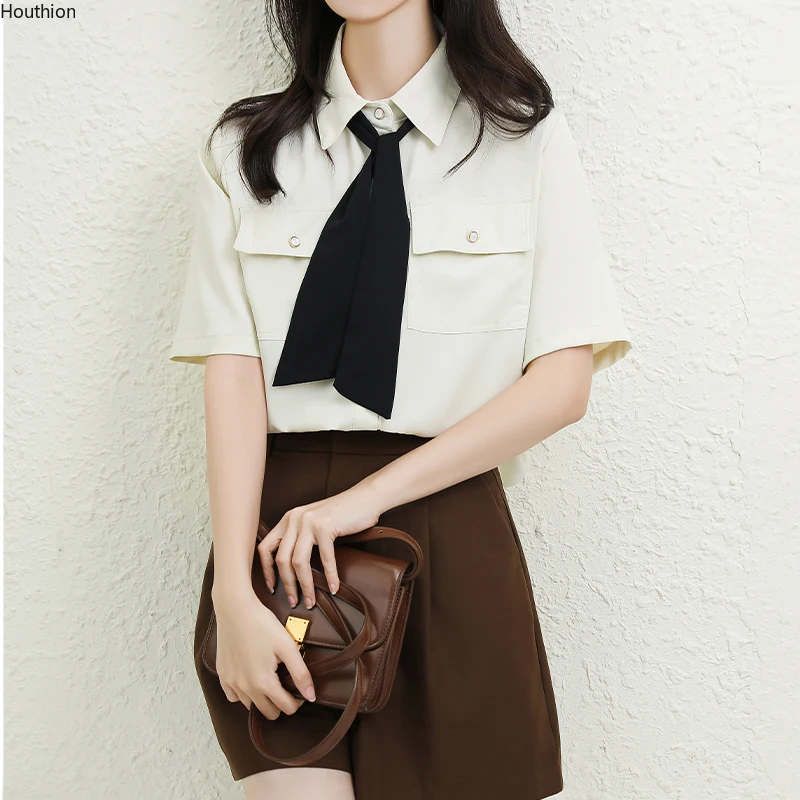 

Блузка женская шифоновая приталенная, Однотонная рубашка с карманами, на пуговицах, с бантом, модный топ с коротким рукавом в повседневном с...