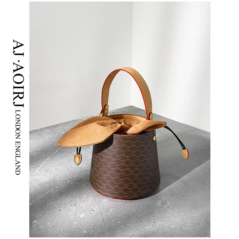 

British niche design vintage bucket bag portable presbystanding cylinder bag personalized shoulder messenger bag