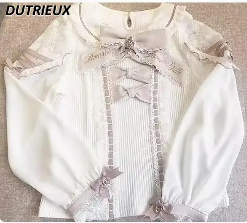 Женская трикотажная рубашка с бантом