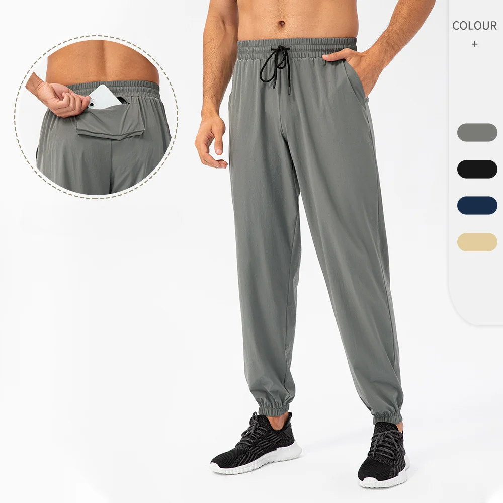 

Men's loose fitting sports pants, leggings, casual stretch breathable fitness pants, running training lace up elastic pants