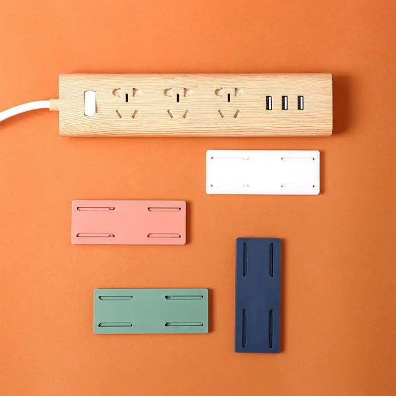 

Power Strip Holder Fixator No Hole Plug-in Wall Socket Sticker Fixer Wall Fixer For WiFi Router Remote Control Paper Towel Box