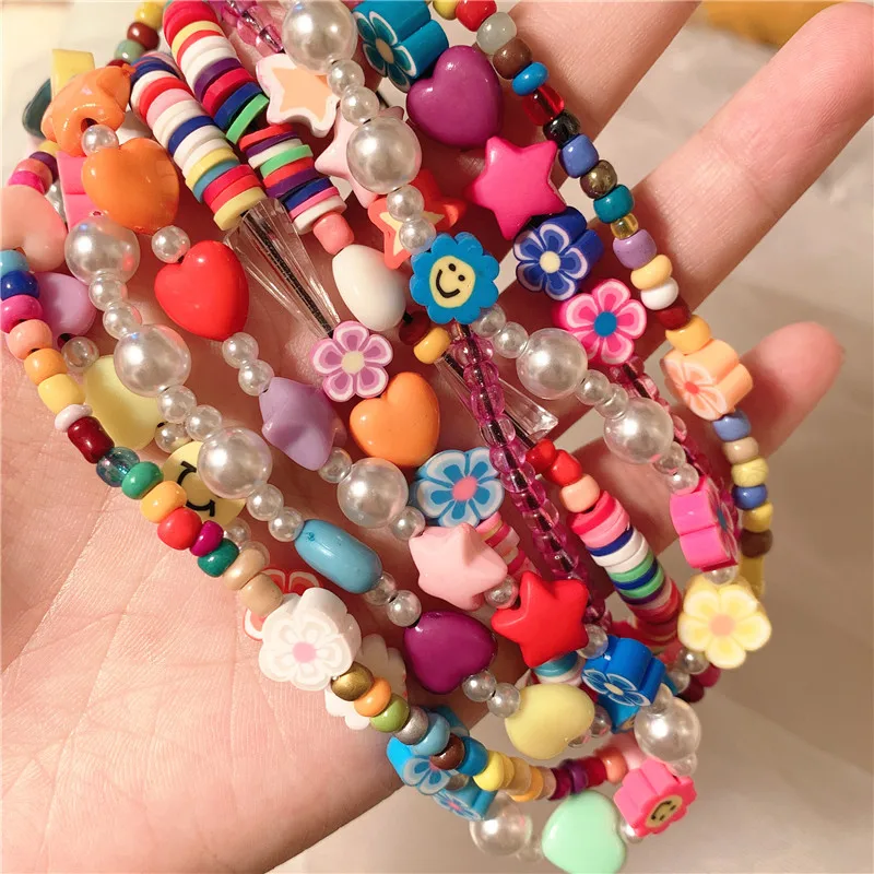 

Boho Soft Pottery Flower Beaded Phone Chain For Women Color Love Heart Pearl Mobile Phone Lanyard Acrylic Phone Accessories Gift