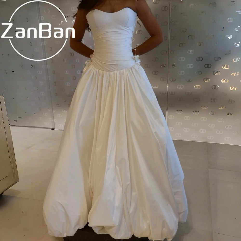 Фото Свадебное платье ZanBan Simple Satin 2026 для фотосессии в Корее, без рукавов, в пол, с корсетом и лентами, на заказ №1