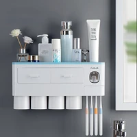 magnetic adsorption inverted toothbrush holder double automatic toothpaste squeezer dispenser storage rack bathroom accessories