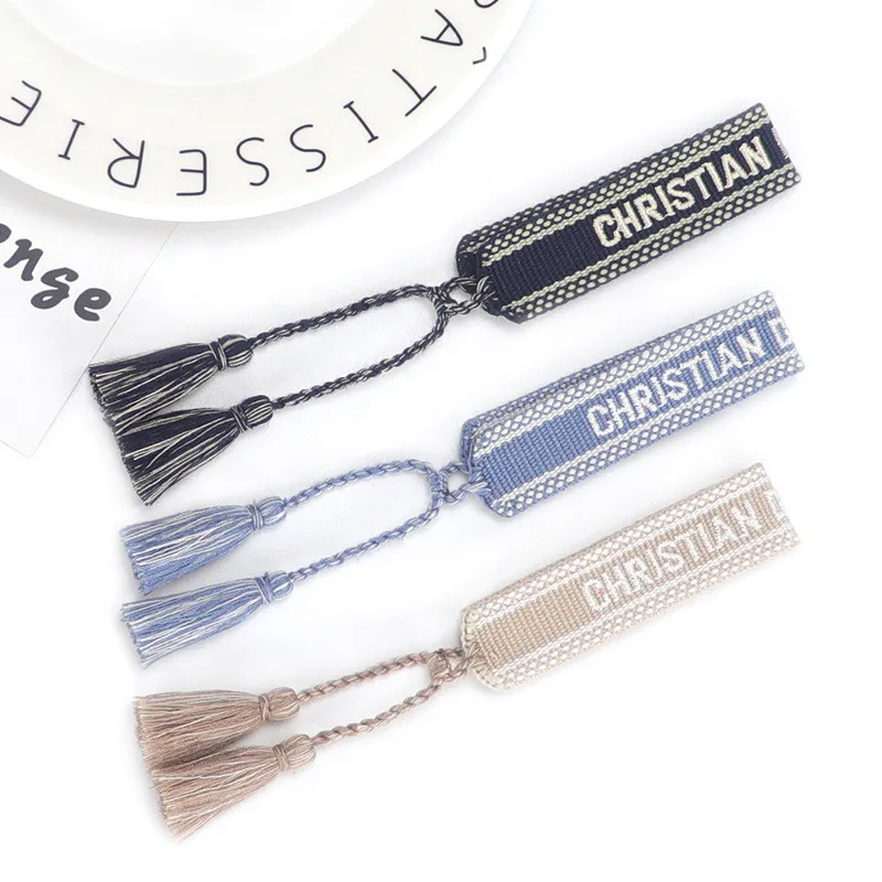 

Embroidered Wrist Band Drawstring and tassel Letter Braided Bracelet Women Jewelry Wholesale High Quality