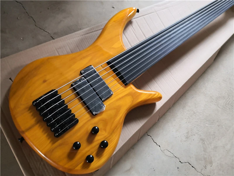 

Custom without fret Solid natural ash transparent yellow body 7 string electric bass guitar in stock 62