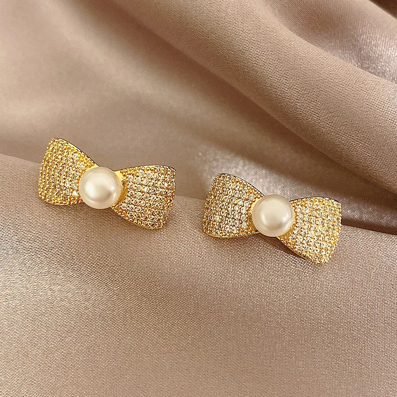 

ЦИРКОНИЕВЫЕ серьги с бантом и жемчугом