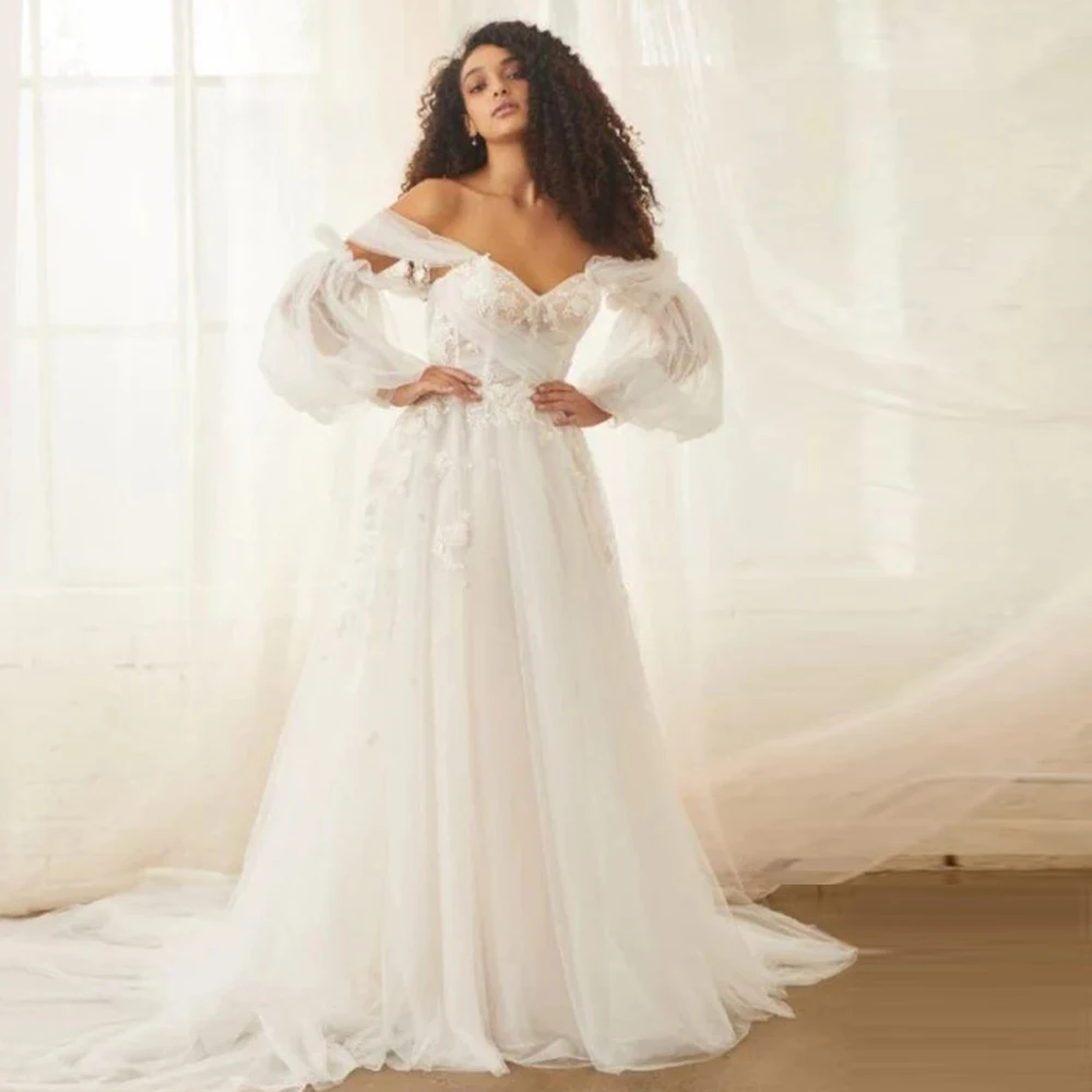 

Elegant Long Sleeves Wedding Dresses Off the Shoulder Tulle A-Line Floor-Length Bridal Gowns Appliques Illusion Robe De Mariee