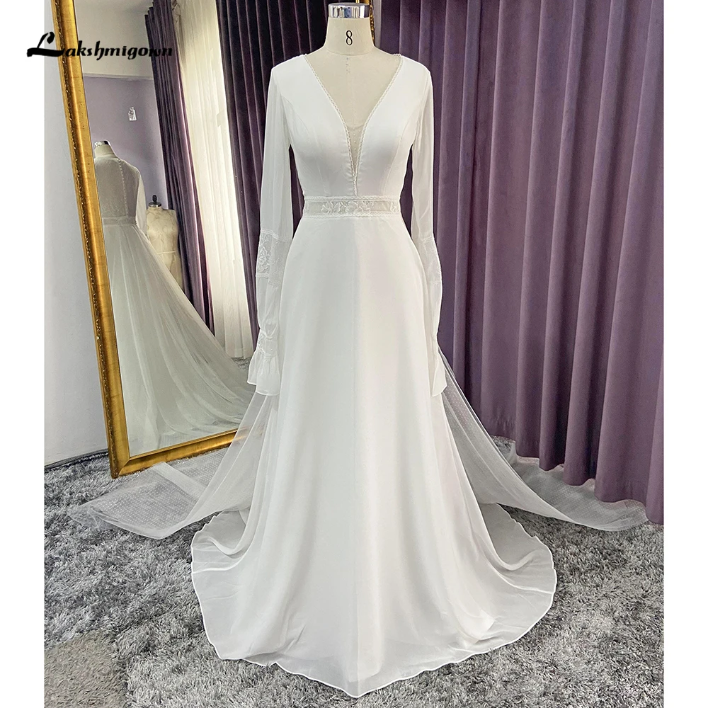 

Женское платье с длинным рукавом и V-образным вырезом