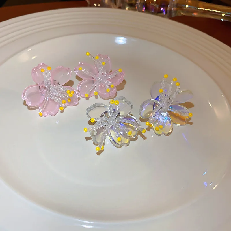 

Acrylic flower earrings Korean Bohemian girl earrings spring small and fresh super fairy temperament earrings
