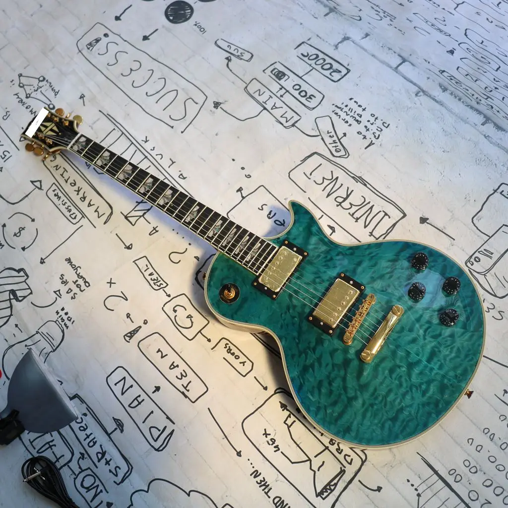 

Classic LP green tiger pattern, upgraded cartridge, real shell inlaid fingerboard, mahogany body, physical shooting