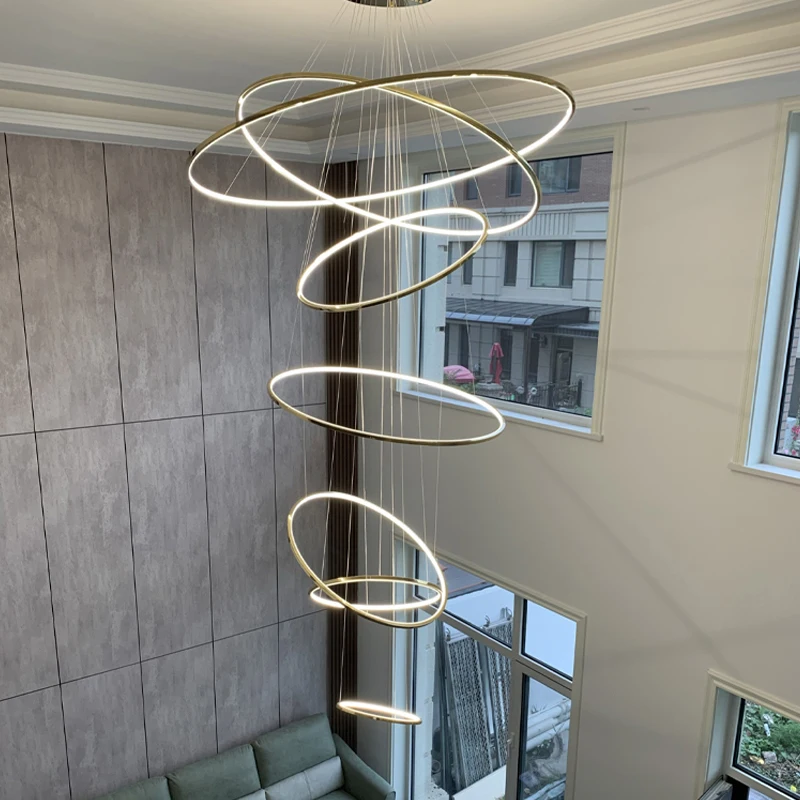 

Duplex building light luxury chandelier villa living room chandelier modern minimalist style circular staircase chandelier