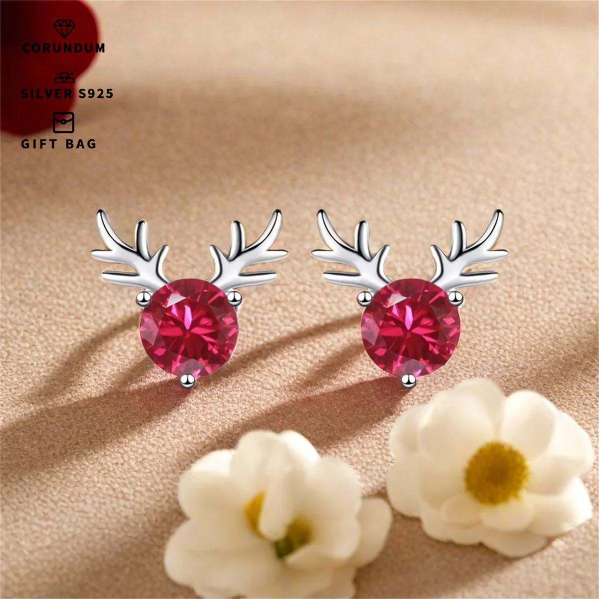 Пара серег-гвоздиков инкрустированных красным корундом S925 посеребренные