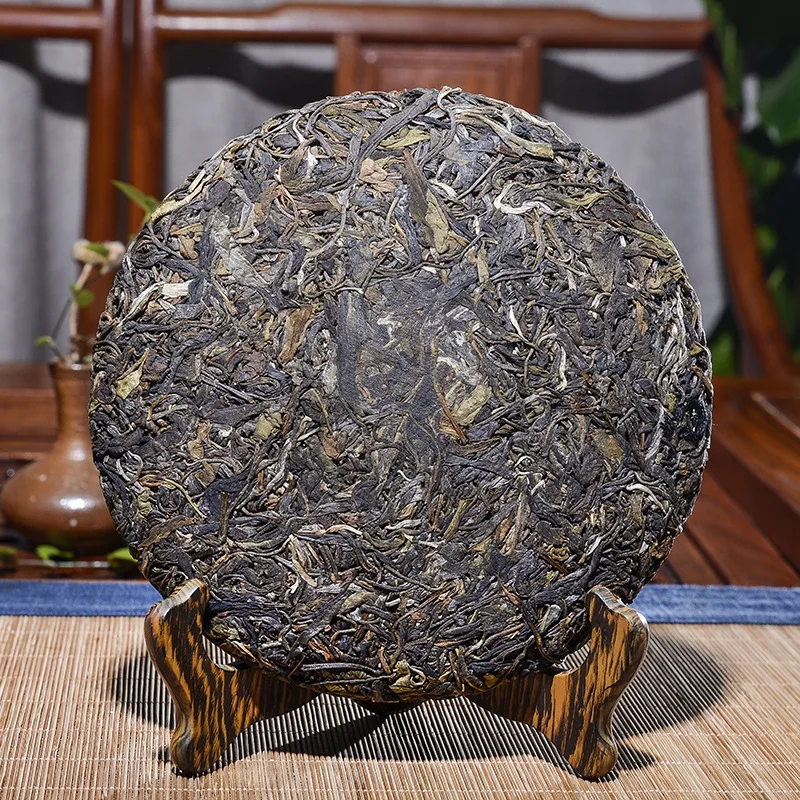 

Китайский Юньнань Пуэр чай, сырой чай 357 г, чай с большими листьями, прямые продажи с завода, зеленая еда для здоровья, чайный горшок