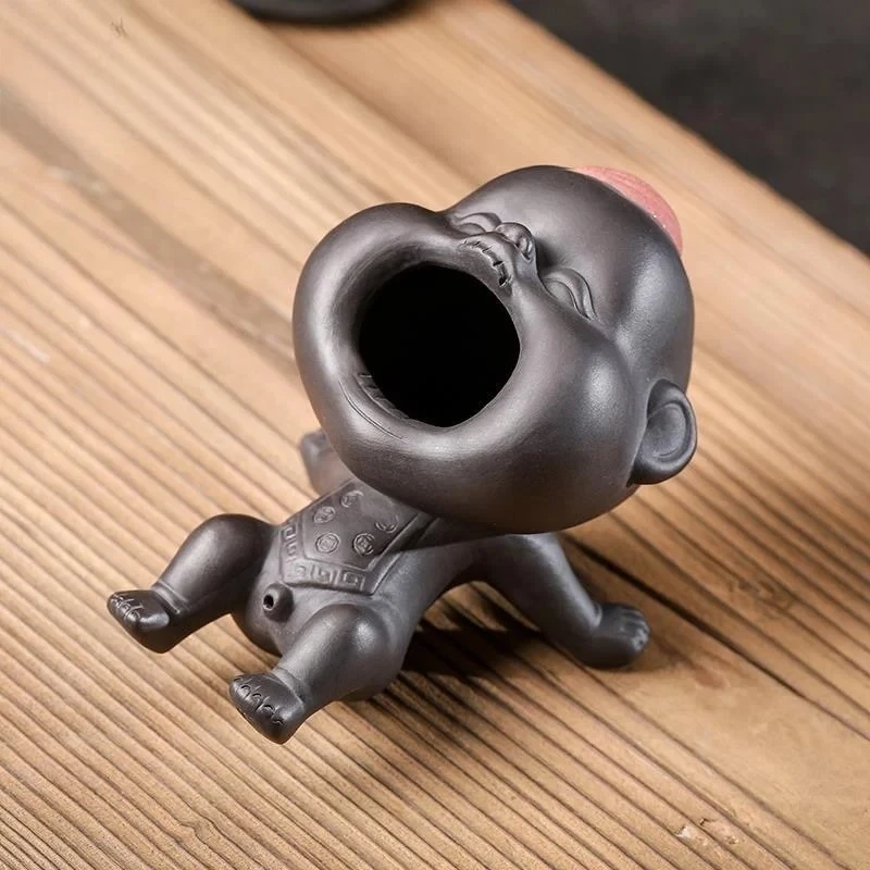 

Фигурка из фиолетовой глины для чайной церемонии