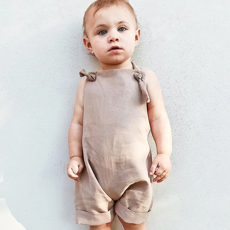 

Toddler Baby Boys Girls Sleeveless Rompers Cross Backless Tie Strap Jumpsuit Overalls Solid Color Rolled Hem Infant Shorts QX2D