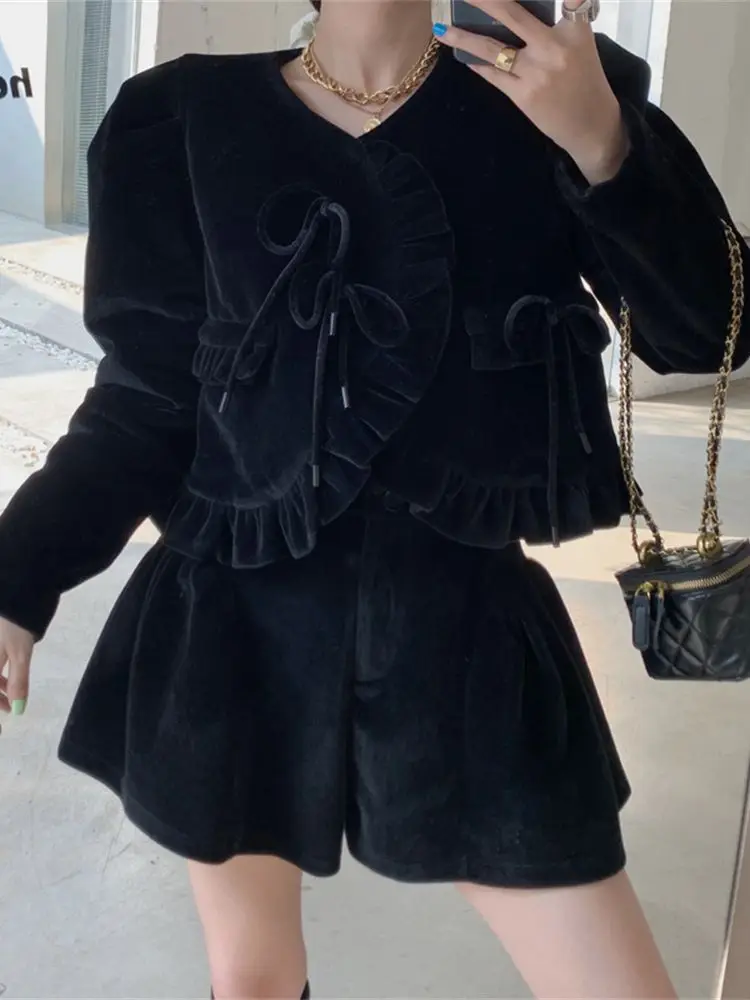 

Комплект из двух предметов с черным бантом и бархатной юбкой с высокой талией