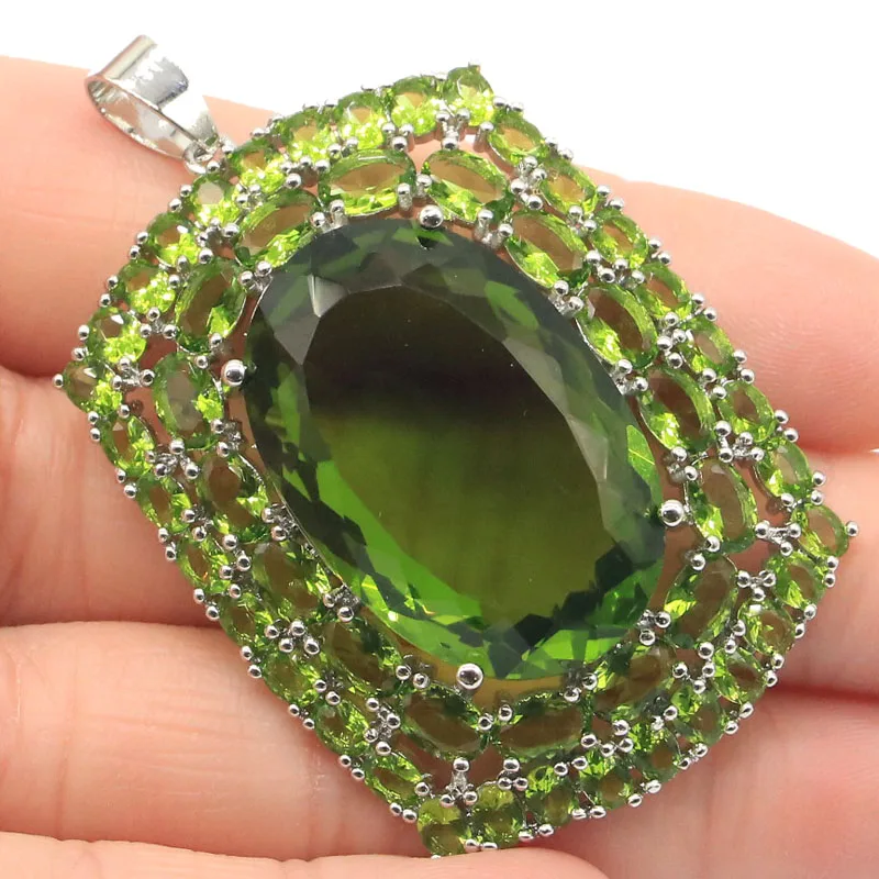 

Кулон длинный из серебра 925 пробы, 18 г, с розовым турмалином и Перидотом