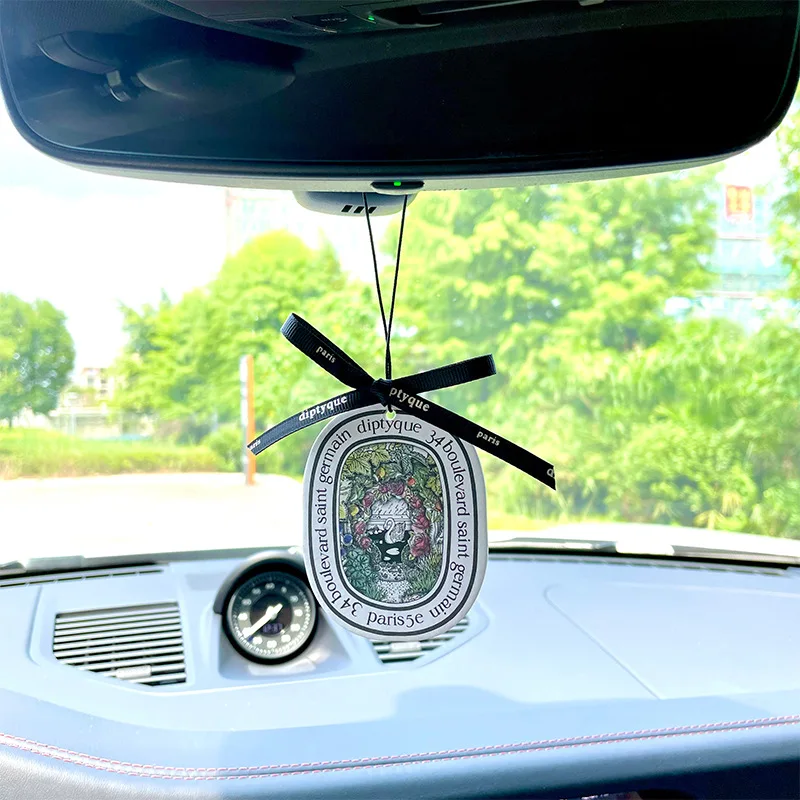 

Car aromatherapy tablets inside the car aromatherapy car fragrance pendant car perfume hanging