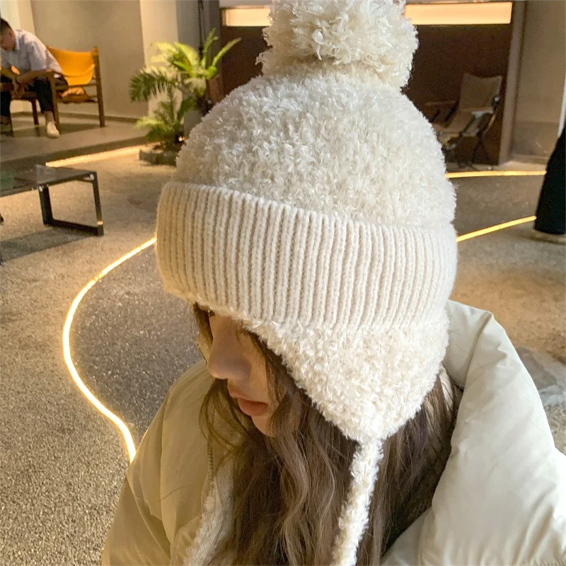 

Шапка-бини женская с помпоном, Повседневная зимняя мягкая теплая однотонная утепленная шапка-бомбер с защитой ушей, на шнуровке, с защитой от ветра