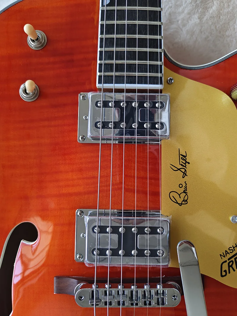 Электрическая гитара с грифом из палисандра