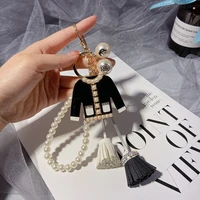 creative small fresh camellia tassel keychain bag pendant pearl chain clothes car accessories fashion small gifts wholesale