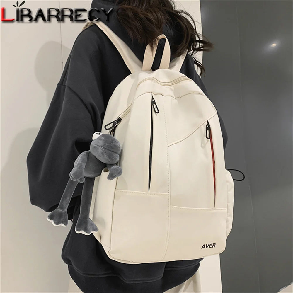 

Fashion Cute Pendant Design High Quality Nylon Women's Backpack Large Capacity Youth Laptop Backpack Student School Bag Bolsos