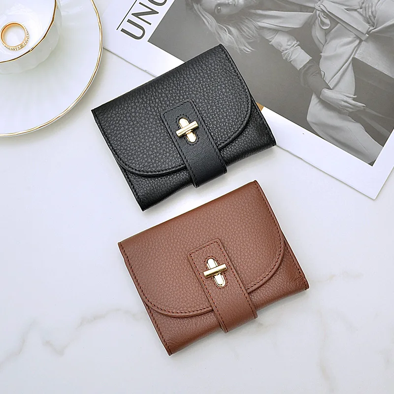

Short wallet with three-fold buckle 2023 new solid color top layer cowhide wallet multi-card slot card bag trend