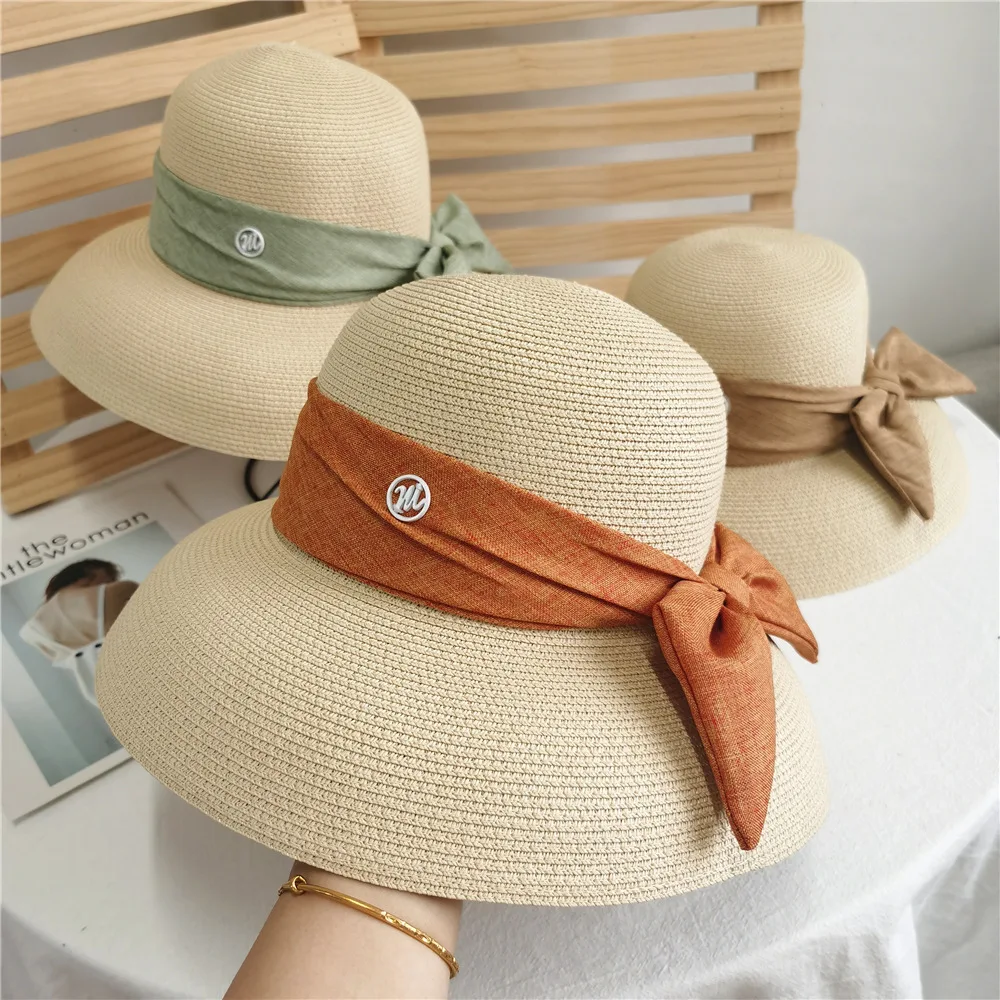 

Delicate and simple Hepburn style bow big brim straw hat fashion streamer sun visor seaside holiday fisherman's hat
