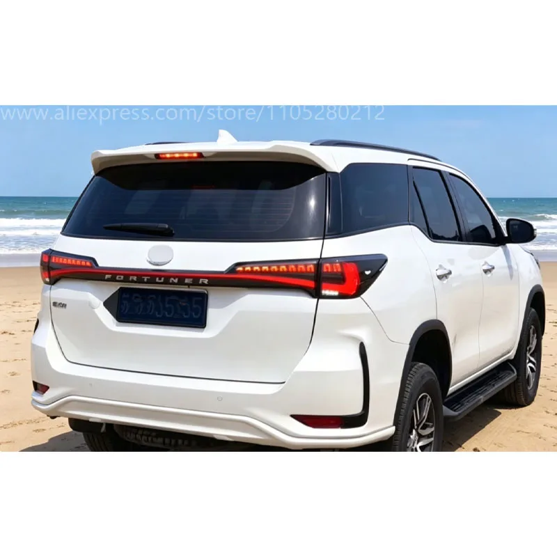 Фото Подходит для Toyota Fortuner 2016-2021 годов выпуска, улучшенный задний спойлер со светодиодными стоп-сигналами, дневными ходовыми огнями и бампером. №4