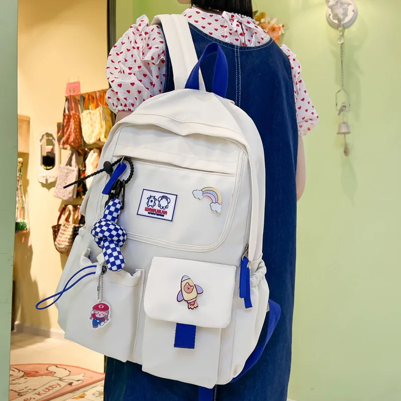 

Водонепроницаемый нейлоновый женский рюкзак с несколькими карманами, милая сумка на плечо с значком для девушек старших классов, милый шко...