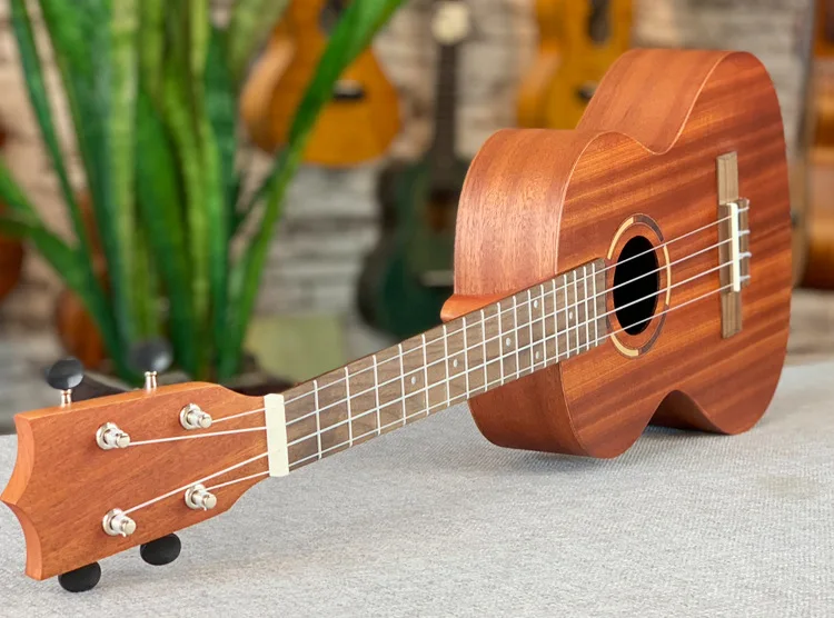 Гитара из красного дерева. Красное дерево гитара. Гитара из красного дерева. Гитара из красного дерева. Акустические гитары taylor из красного дерева.