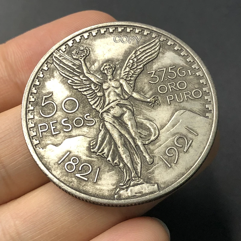 

Памятная монета Мексиканский ангел 50 Peso медная 1921 года