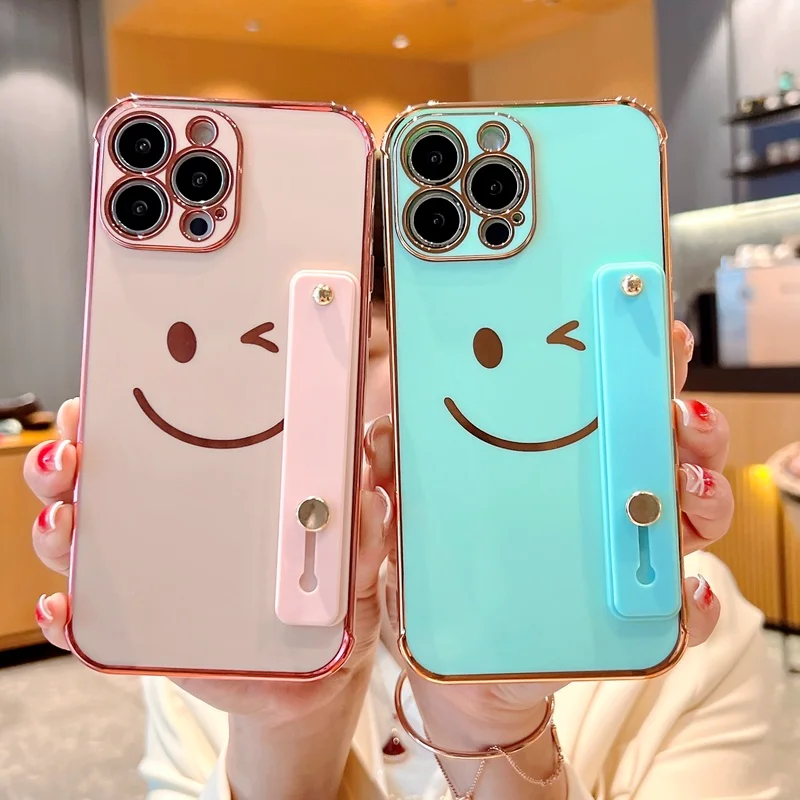 

Cute Smiling Face Wrist Strap Phone Case for iPhone 13 12 11 Pro Max XR XS Max X 7 8 Plus Shockproof Bumper Plating Back Cover