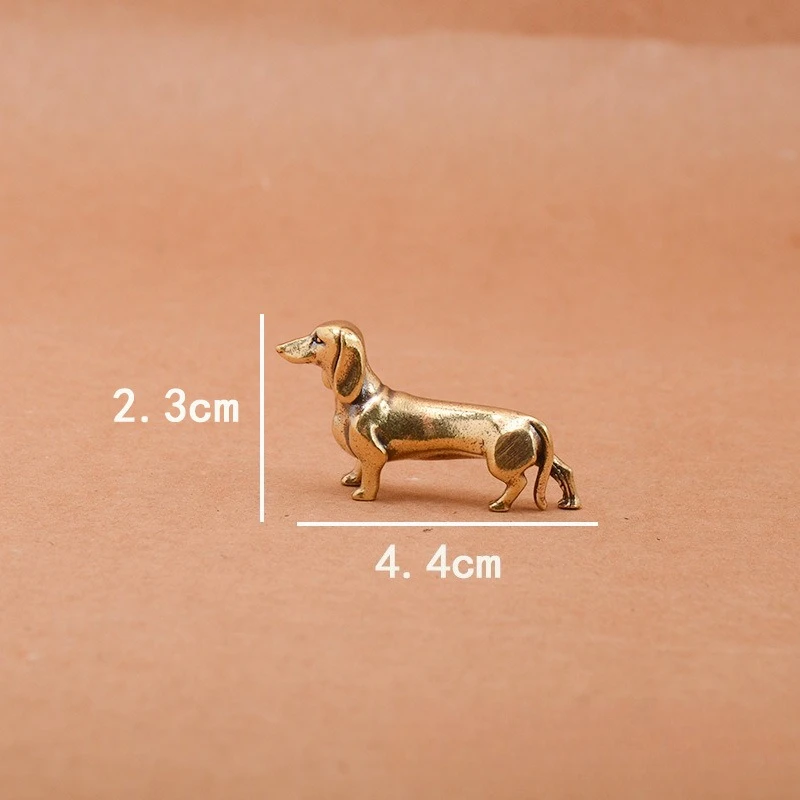 

Латунная статуэтка таксы