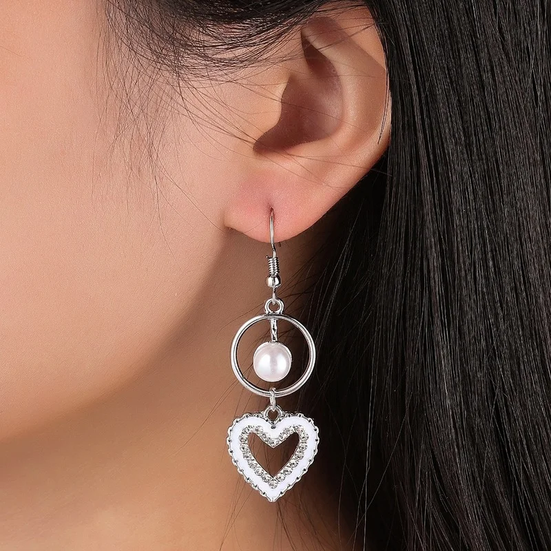 

Valentine's Day New Korean Taoxin hollow out Earrings Fashion flash diamond pearl earrings