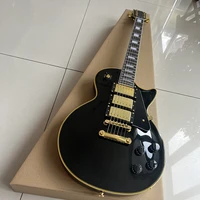 this is a classic 6 string electric guitar with black body and golden edge it has beautiful sound and is mailed home